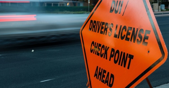 DUI checkpoint sign on the road